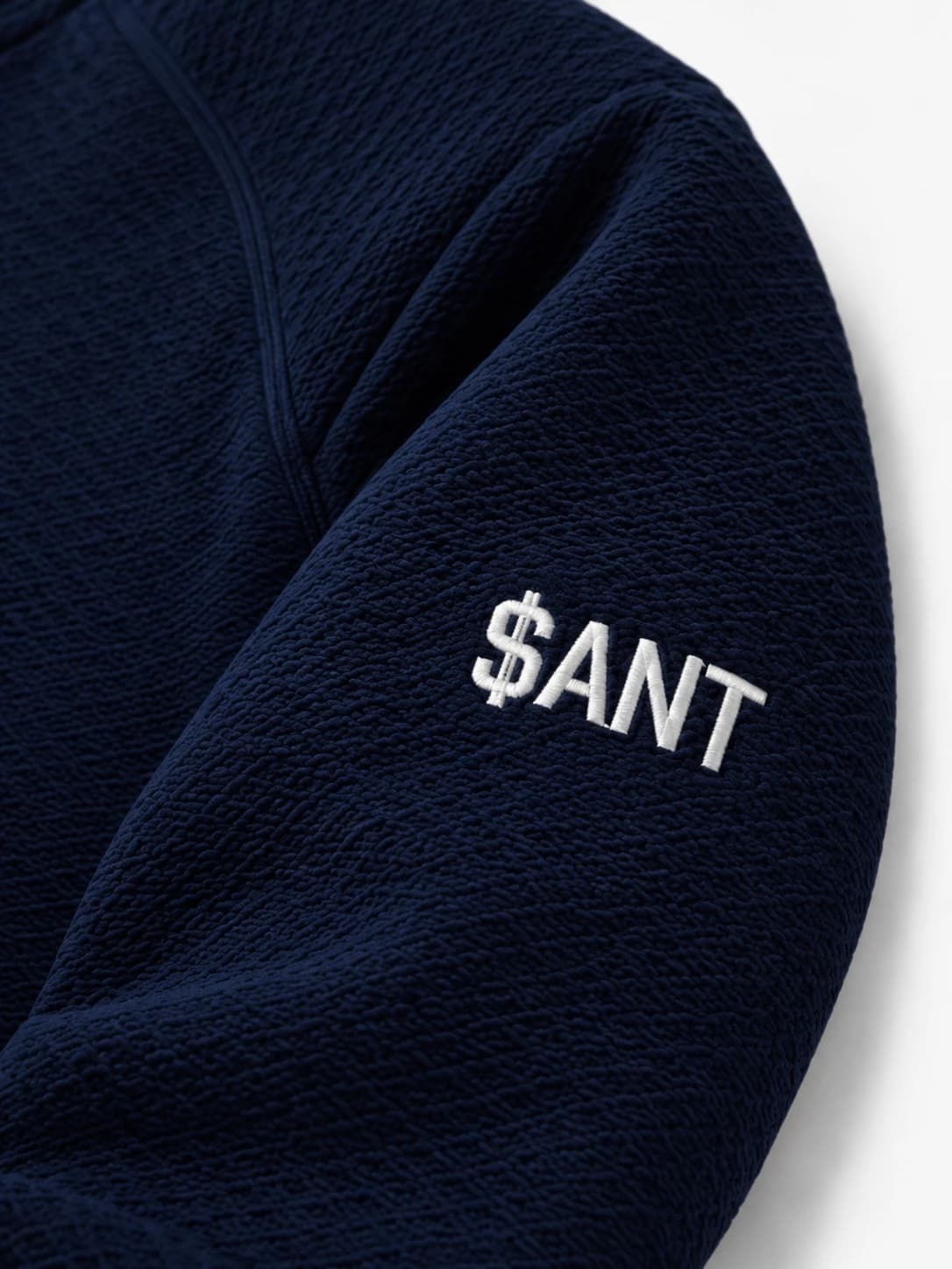 Close-up of the sleeve with the embroidered $ANT cashtag